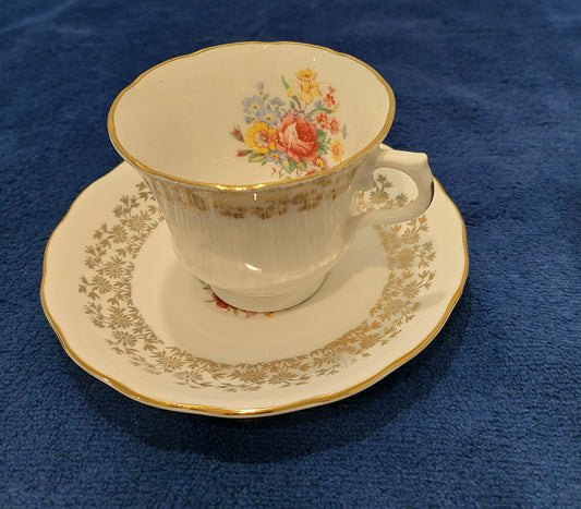 RV011 - Royal Vale Bone China Teacup and Saucer with Beautiful Rose and Dainty Floral Motif