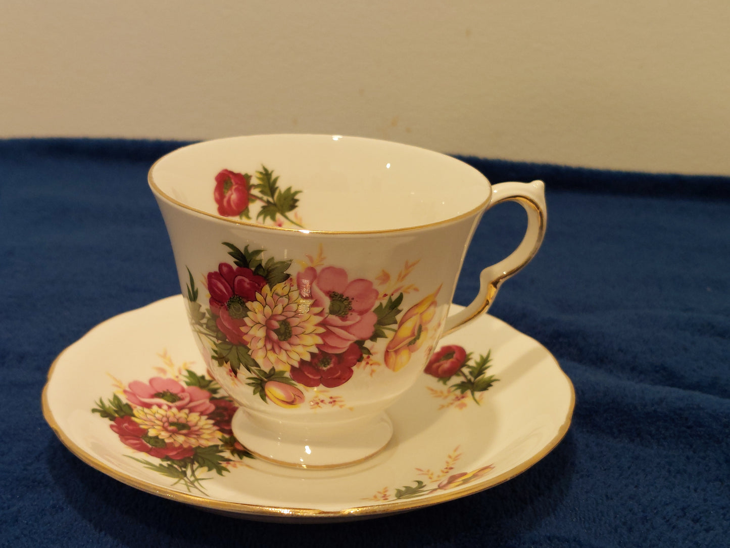 QA003 – Queen Anne Bone China Teacup and Saucer with Floral Design