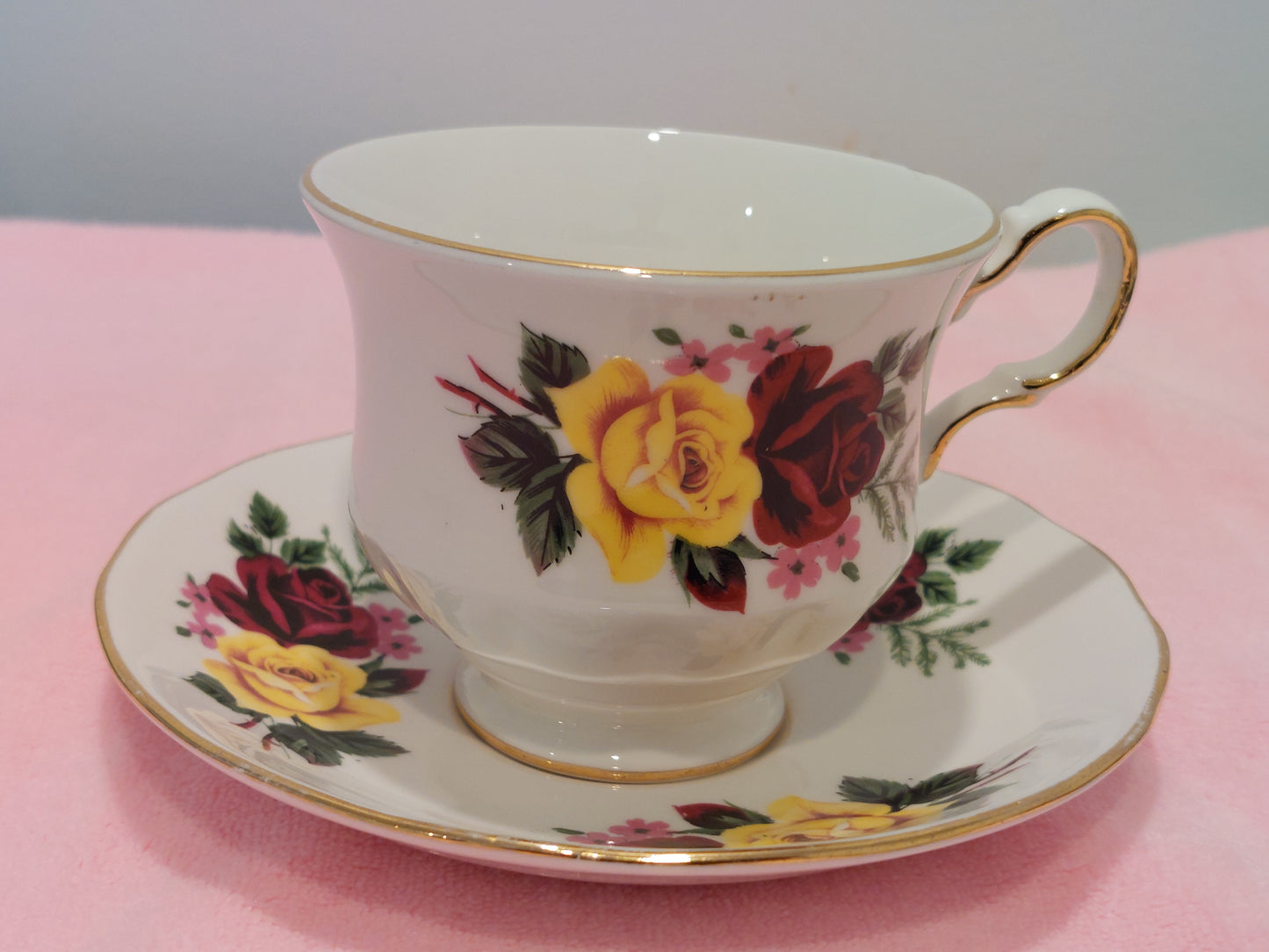 QA004 – Queen Anne English Bone China “Red & Yellow Roses” Teacup and Saucer