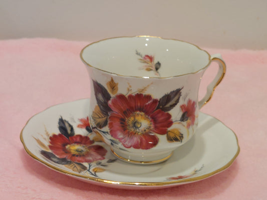 QA006 – Queen Anne Bone China “Bold Magenta Floral Design” Teacup and Saucer